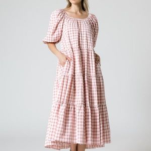 Tiered dress with puff sleeves and pockets! 
95% Polyster, 5% Spandex, Lined